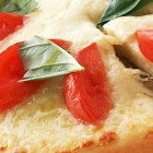 Pizza with cheese and tomatoes
